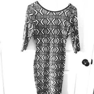 Half sleeve fitted dress. Size Medium